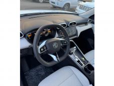 MG